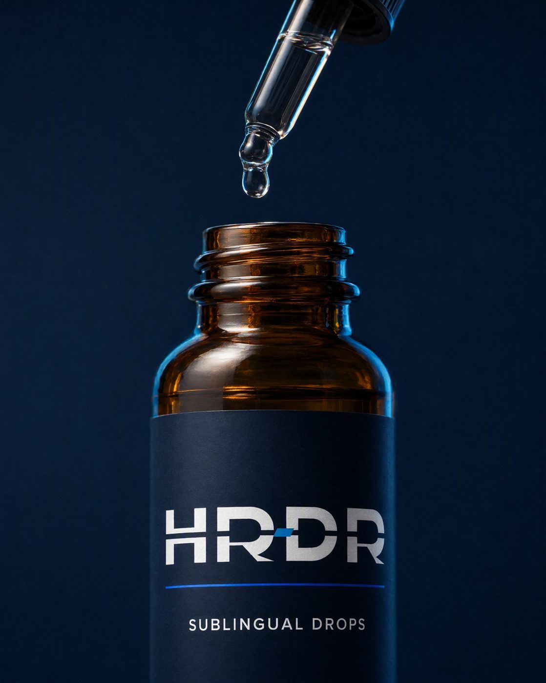 Close-up of the HRDR dropper above the open vial